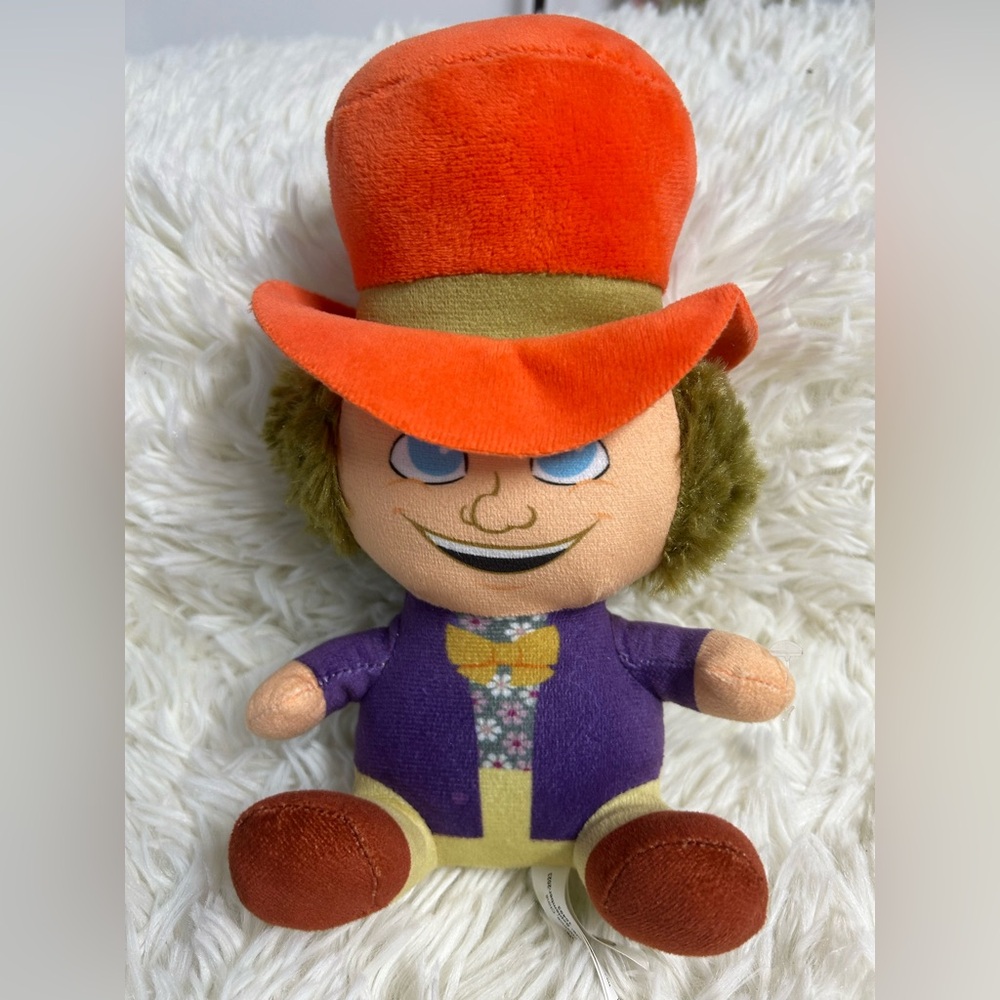 Charming Plush Toy with Orange Hat and Purple Outfit
